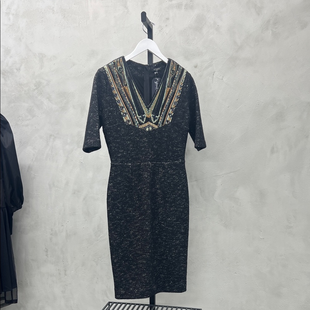 Elegant Black Dress with Embellished Neckline